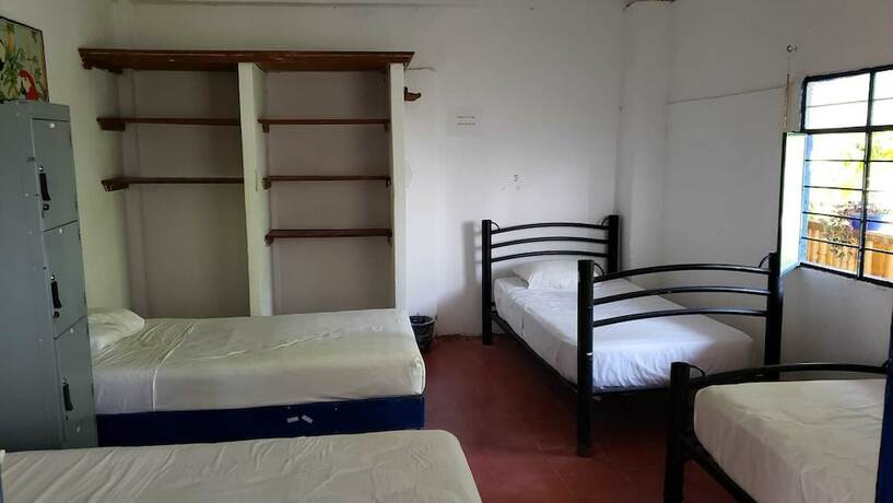 Imagen de la habitación del Hotel and Hostal Mayflower. Foto 11