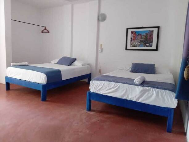 Imagen de la habitación del Hotel and Hostal Mayflower. Foto 12