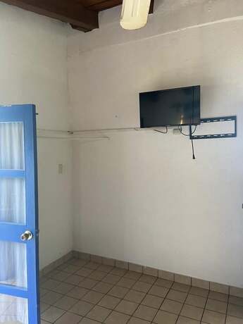 Imagen de la habitación del Hotel and Hostal Mayflower. Foto 16