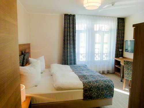 Imagen de la habitación del Hotel and Living Am Wartturm. Foto 9