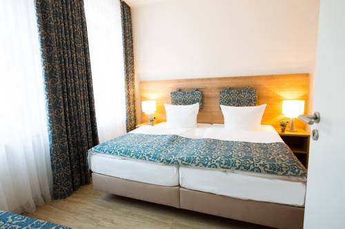 Imagen de la habitación del Hotel and Living Am Wartturm. Foto 10