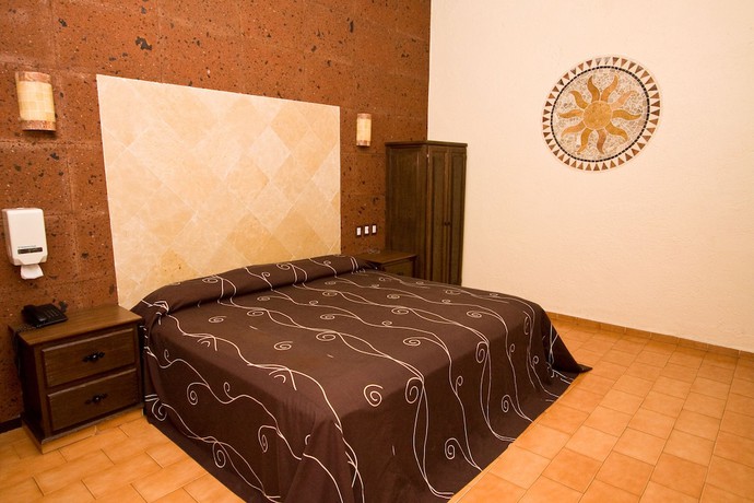 Imagen de la habitación del Hotel and Motel Hacienda Jiutepec. Foto 11