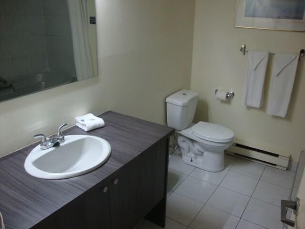 Imagen de la habitación del Hotel and Motel le Luxembourg. Foto 11
