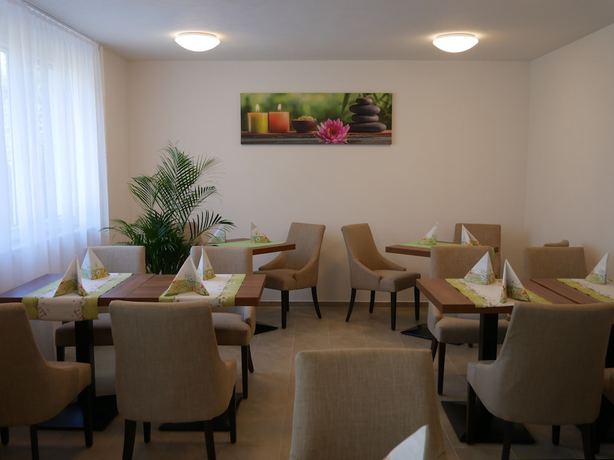 Imagen del bar/restaurante del Hotel and M&uuml;hlenapartments. Foto 3