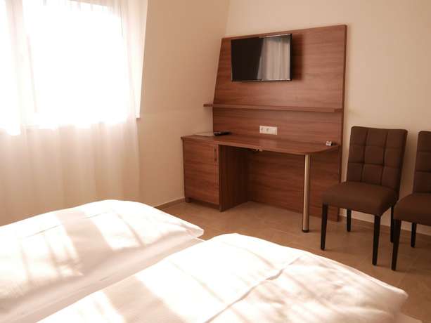Imagen de la habitación del Hotel and M&uuml;hlenapartments. Foto 18