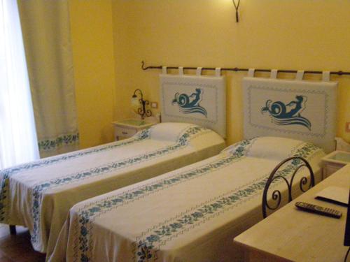 Imagen de la habitación del Hotel and Residence Le Nereidi & Conference. Foto 7