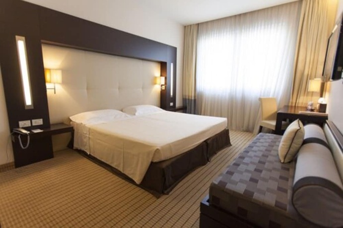 Imagen de la habitación del Hotel and Residence Villa Bartolomea. Foto 14