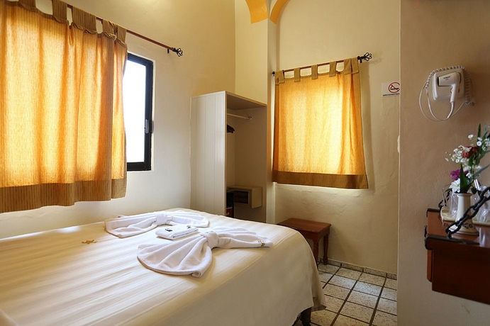 Imagen de la habitación del Hotel and Restaurant Bucaneros, Isla Mujeres. Foto 16