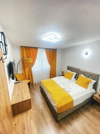 Imagen de la habitación del Hotel and Restaurant Domestika. Foto 18