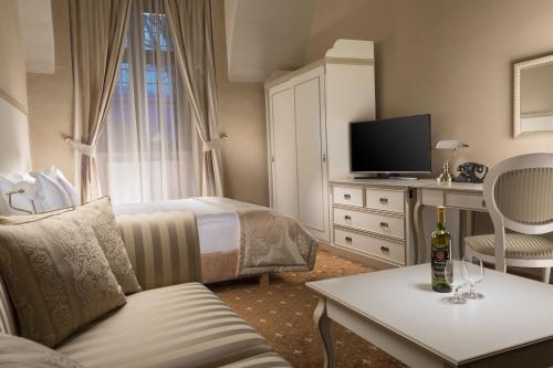 Imagen de la habitación del Hotel and Restaurant Gino Park Palace. Foto 6