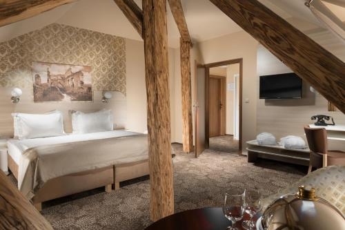 Imagen de la habitación del Hotel and Restaurant Gino Park Palace. Foto 8