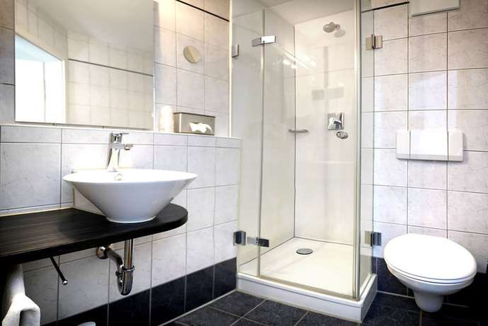 Imagen de la habitación del Hotel and Restaurant Gr&uuml;ner Baum. Foto 7