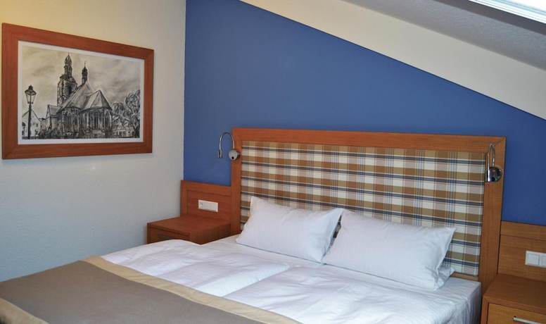 Imagen de la habitación del Hotel and Restaurant Waldcafe Hettstedt. Foto 6