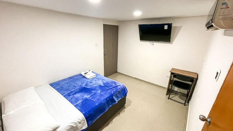 Imagen de la habitación del Hotel and Restaurante Oasis. Foto 8