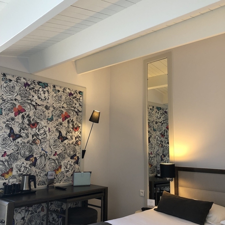 Imagen de la habitación del Hotel and Spa Les Roches Noires. Foto 17