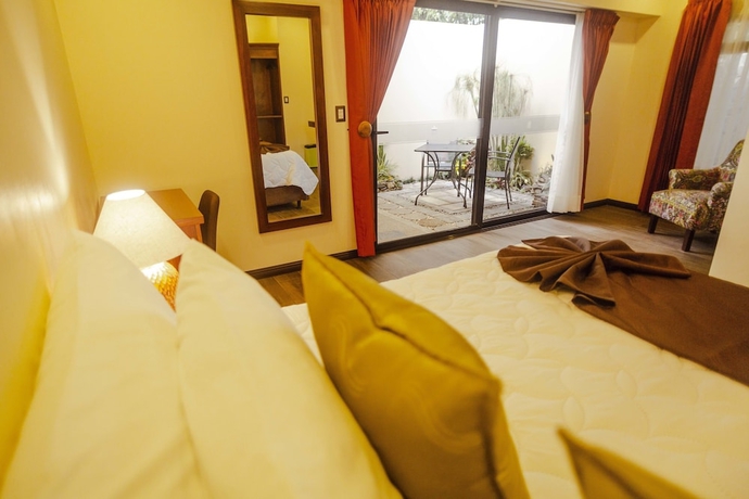 Imagen de la habitación del Hotel and Spa Poco A Poco. Foto 10