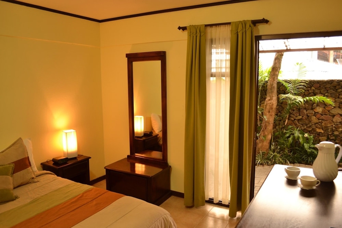 Imagen de la habitación del Hotel and Spa Poco A Poco. Foto 12