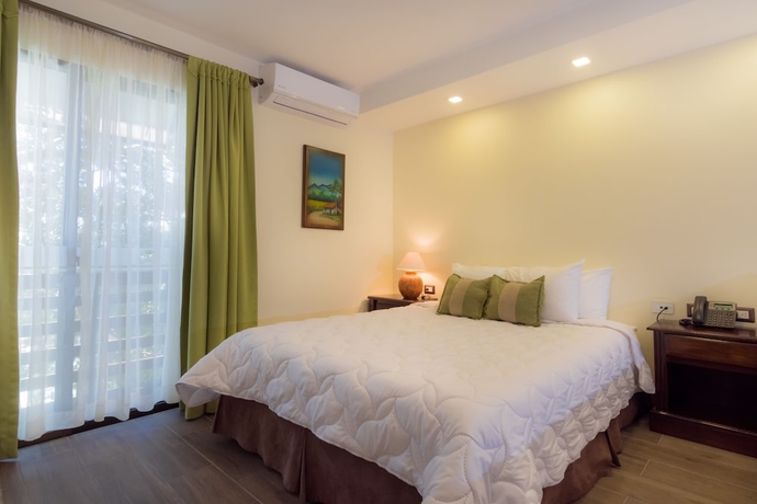 Imagen de la habitación del Hotel and Spa Poco A Poco. Foto 15