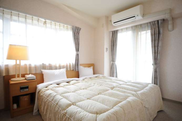 Imagen de la habitación del Hotel and Spa Resort La Vista Izusan. Foto 18