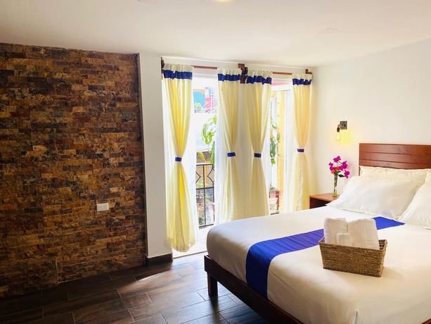 Imagen de la habitación del Hotel and Suites Cerro Rojo. Foto 3