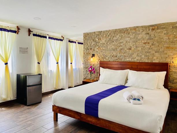 Imagen de la habitación del Hotel and Suites Cerro Rojo. Foto 6