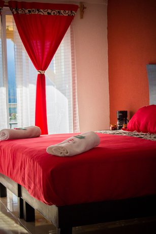 Imagen de la habitación del Hotel and Suites Cerro Rojo. Foto 10