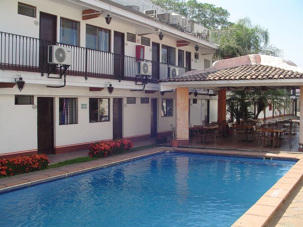 Imagen de la habitación del Hotel and Suites Coral. Foto 3