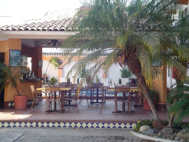 Imagen de la habitación del Hotel and Suites Coral. Foto 6