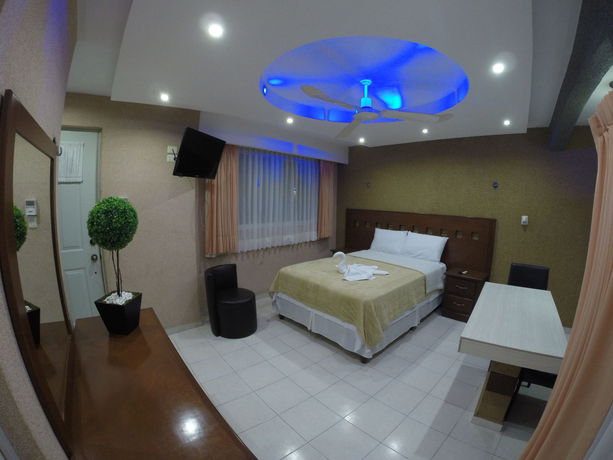 Imagen de la habitación del Hotel and Suites Country. Foto 14