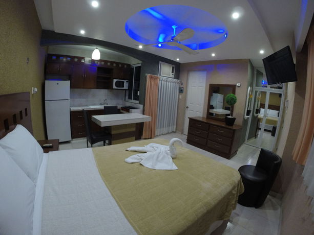 Imagen de la habitación del Hotel and Suites Country. Foto 16