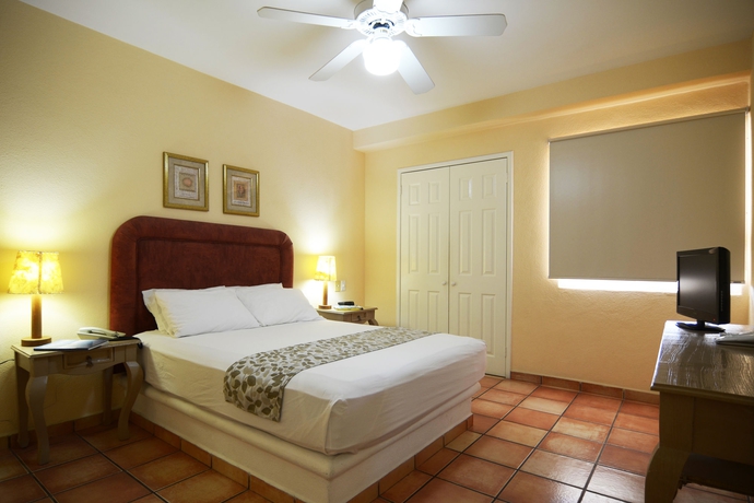 Imagen de la habitación del Hotel and Suites Las Palmas. Foto 11