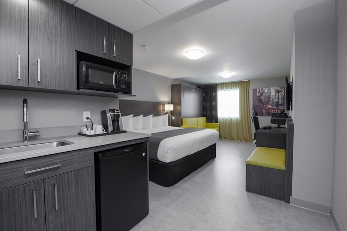 Imagen de la habitación del Hotel and Suites Le Dauphin Quebec. Foto 4