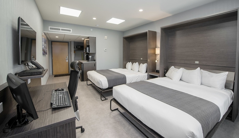 Imagen de la habitación del Hotel and Suites Le Dauphin Quebec. Foto 11