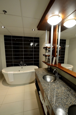 Imagen de la habitación del Hotel and Suites Le Dauphin Quebec. Foto 14