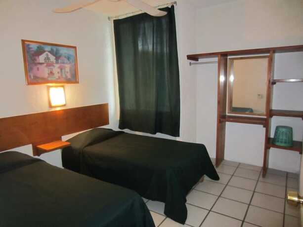 Imagen de la habitación del Hotel and Suites Luna Mexicana. Foto 9