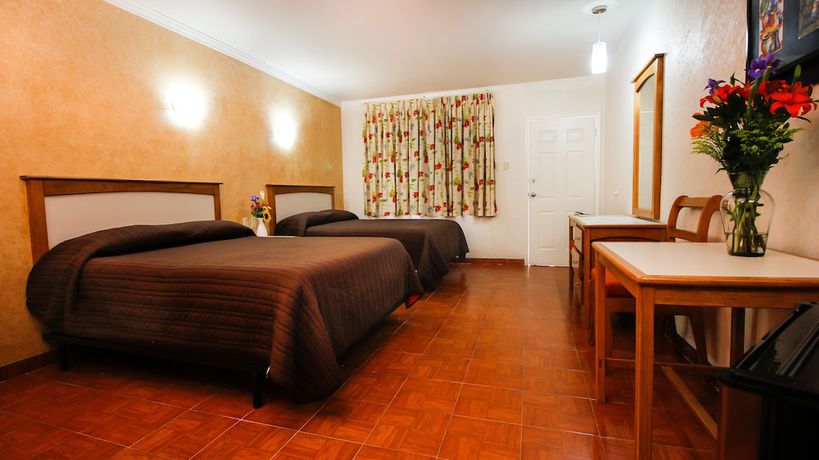 Imagen de la habitación del Hotel and Suites Marrod. Foto 18