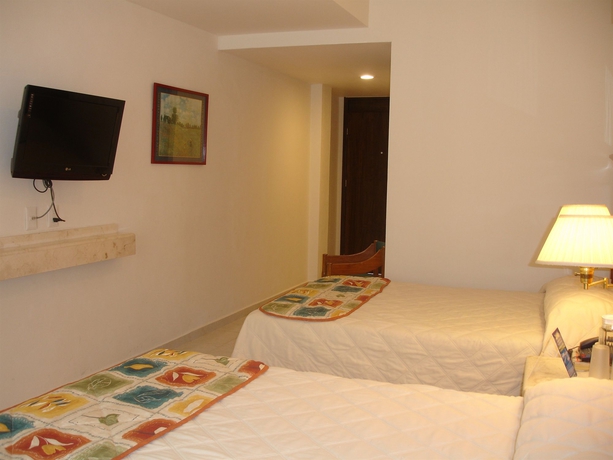 Imagen de la habitación del Hotel and Suites Nader. Foto 7