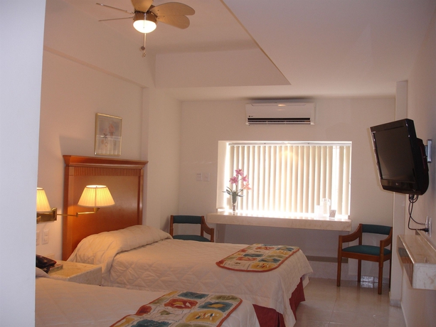 Imagen de la habitación del Hotel and Suites Nader. Foto 9