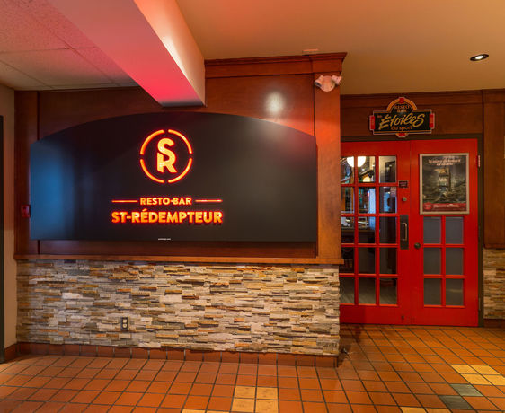 Imagen del bar/restaurante del Hotel and Suites Normandin L&eacute;vis. Foto 6
