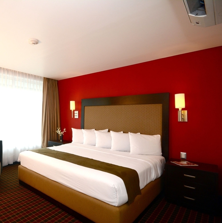 Imagen de la habitación del Hotel and Suites Pf. Foto 9