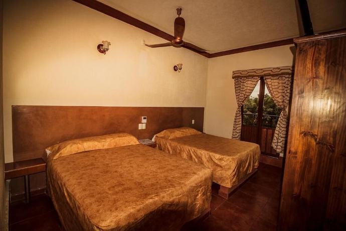 Imagen de la habitación del Hotel and Suites Posada Molina. Foto 16