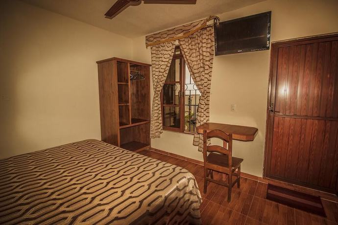 Imagen de la habitación del Hotel and Suites Posada Molina. Foto 17