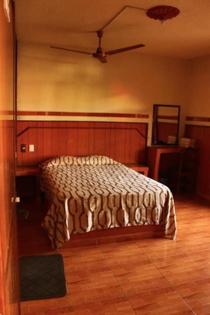 Imagen de la habitación del Hotel and Suites Posada Molina. Foto 20