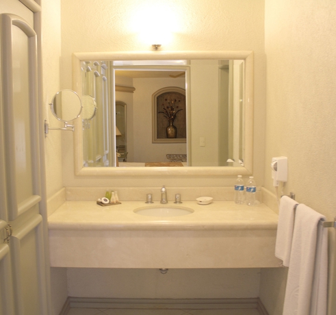 Imagen de la habitación del Hotel and Suites Quinta Magna. Foto 11