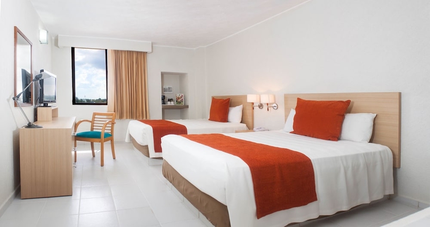 Imagen de la habitación del Hotel and Suites Real Del Lago. Foto 2