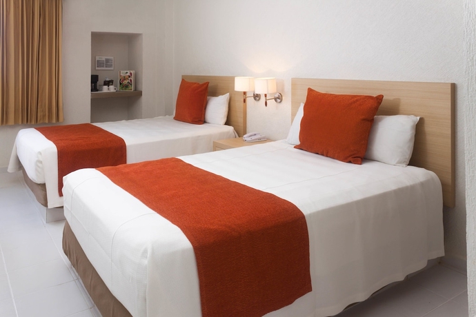 Imagen de la habitación del Hotel and Suites Real Del Lago. Foto 3