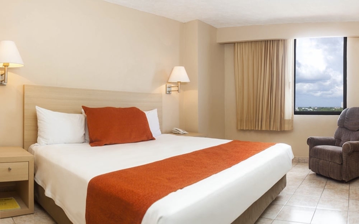 Imagen de la habitación del Hotel and Suites Real Del Lago. Foto 4