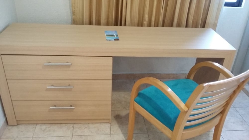 Imagen de la habitación del Hotel and Suites Real Del Lago. Foto 6