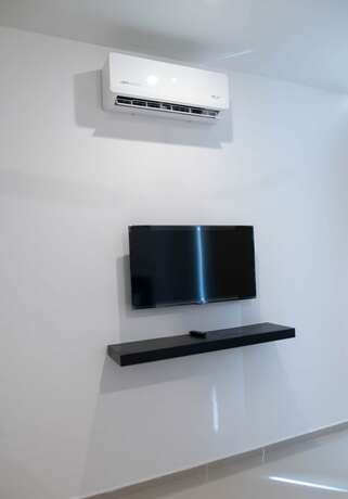 Imagen de la habitación del Hotel and Suites Yuca Ville. Foto 13
