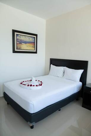 Imagen de la habitación del Hotel and Suites Yuca Ville. Foto 15